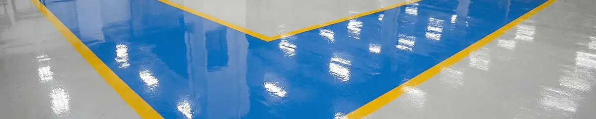 A factory floor professionally covered and marked with epoxy flooring in Pembroke Pines, FL