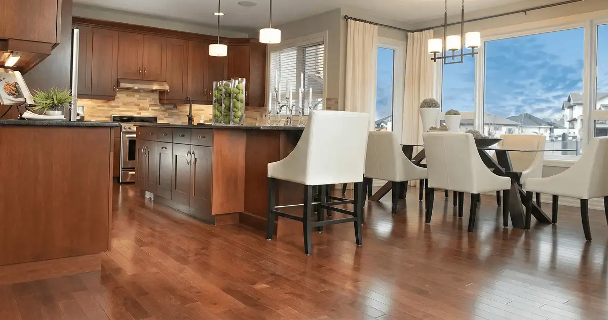 A modern kitchen with professionally installed wood flooring in Pembroke Pines, FL