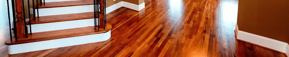 Base floor of a staircase with professionally restored wood flooring in Pembroke Pines FL