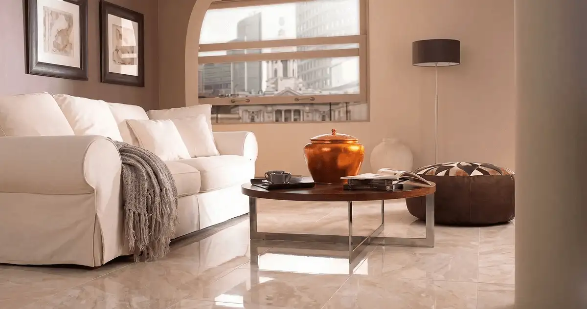 Modern living room with professionally installed marble flooring, a beige sofa, coffee table in Pembroke Pines, FL